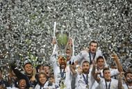 MILAN, ITALY - MAY 28:  Sergio Ramos of Real Madrid lifts the Champions League trophy after victory in the UEFA Champions League Final match between Real Madrid and Club Atletico de Madrid at Stadio Giuseppe Meazza on May 28, 2016 in Milan, Italy.  (Photo by Laurence Griffiths/Getty Images)